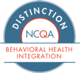 A circular badge with the words Distinction NCQA Behavioral Health Integration, featuring a blue border and white center with red and blue text, symbolizing Montrose Health Care’s commitment to affordable health care.