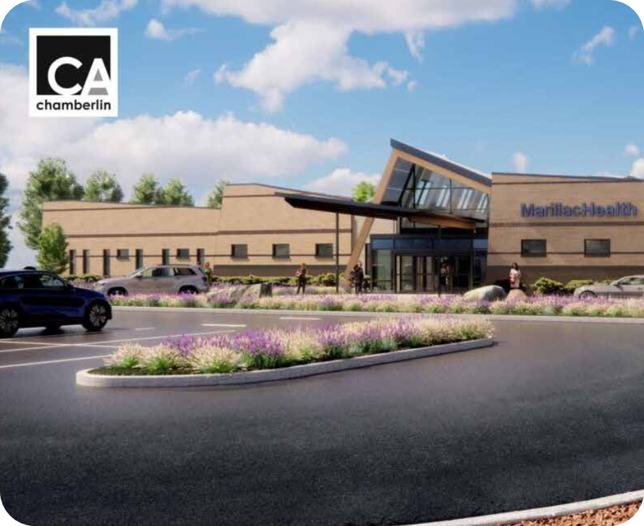 A modern building labeled “MarillacHealth” with large windows and a slanted roof, surrounded by landscaped greenery and a parking lot under a partly cloudy sky, highlights Grand Junction Health Care. A “CA chamberlin” logo is in the top left corner.