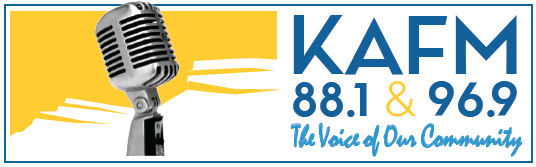 Vintage microphone with a yellow shape in the background. Text reads: KAFM 88.1 & 96.9 The Voice of Our Community, highlighting Affordable Health Care, in blue and gold letters. The design is framed by a blue border.
