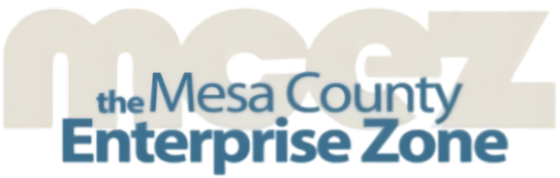 Logo with large, light text mcez in the background and overlapping blue text reading Mesa County Enterprise Zone in the foreground, representing our commitment to affordable health care for the community.
